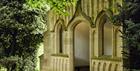 A folly nestled amongst trees in the grounds of The Pig - in the Cotswolds